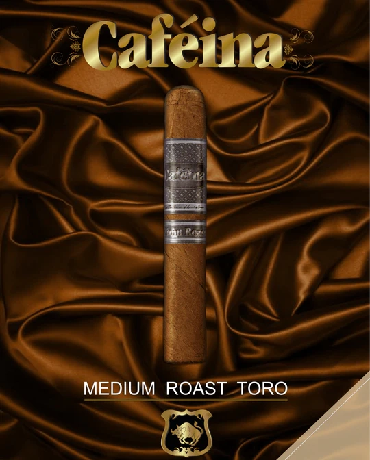 A single cigar resting on a brown, velvet-like surface with the brand name 'CAFEINA' displayed above in a decorative font, and the text 'MEDIUM ROAST TORO' below the cigar. The background is dark and smooth, giving a luxurious feel to the product.