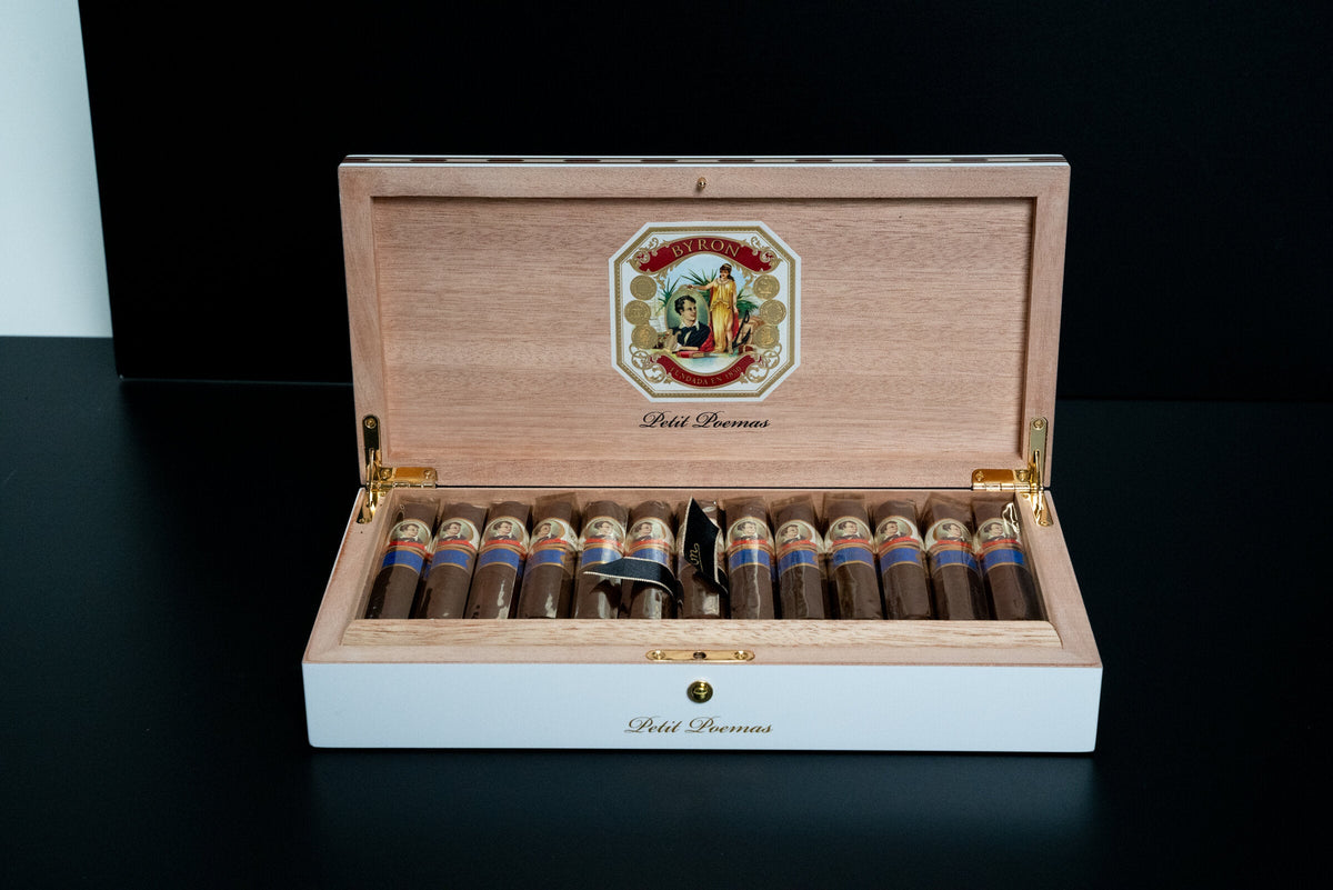 Open white box of Byron Petit Poemas cigars by Selected Tobacco