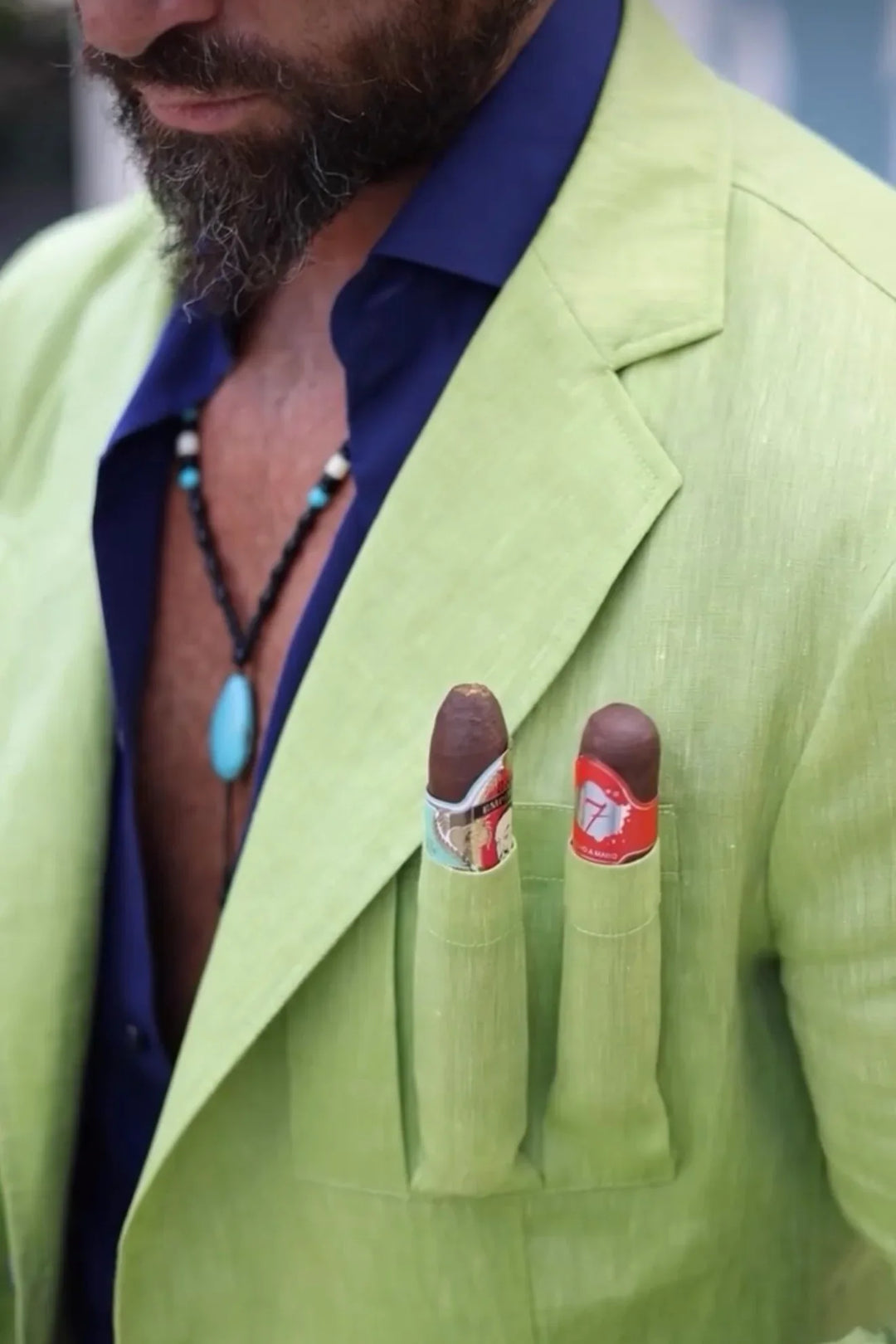 Close up of a light green El Septimo Smoking Suit Jacket with 3 cigar pockets available at Cigar Inc in Woodland Hills, Los Angeles