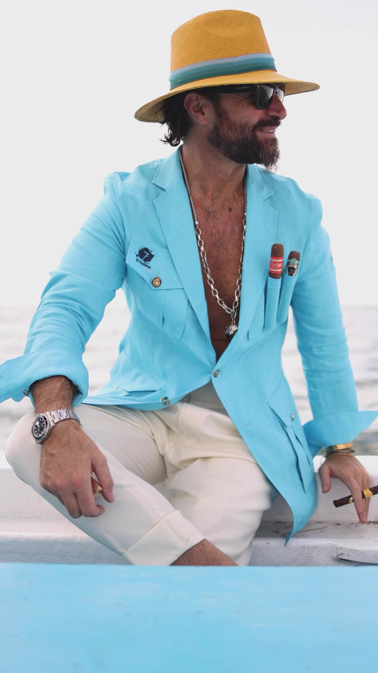 Video of a man wearing a light blue El Septimo Smoking Suit Jacket with 3 cigar pockets available at Cigar Inc in Woodland Hills, Los Angeles